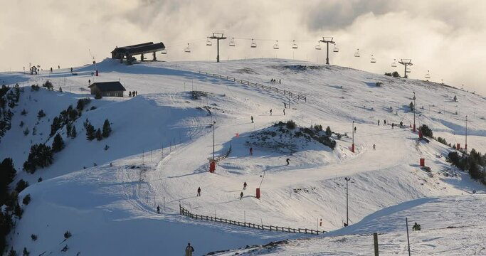 View of the ski slopes in Chamrousse above the clouds