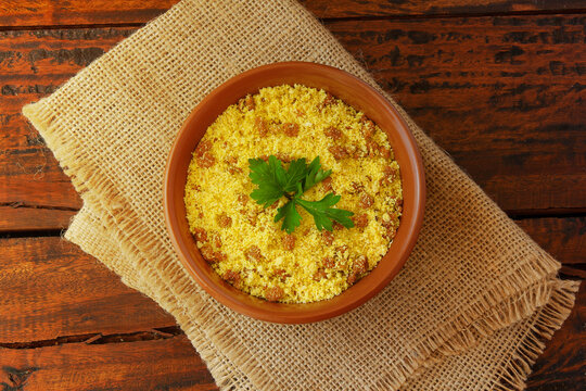 Brazilian farofa. Traditional dish of Brazil cuisine made with manioc flour, widely used in festivities and at Christmas