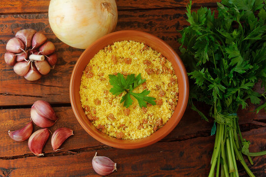 Brazilian farofa. Traditional dish of Brazil cuisine made with manioc flour, widely used in festivities and at Christmas