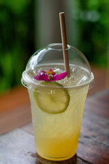 Honey lemon drink on the cafe table background