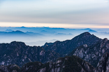 Naklejka na ściany i meble The sea of clouds in the winter morning in the North Seascape of Huangshan Mountain, Anhui, China