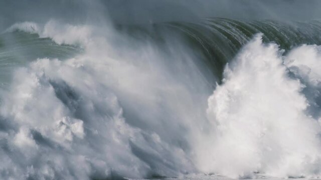 Slow motion of two big waves in Nazar&eacute;, Portugal getting together. Nazar&eacute; is a small village in Portugal with the biggest waves in the world.