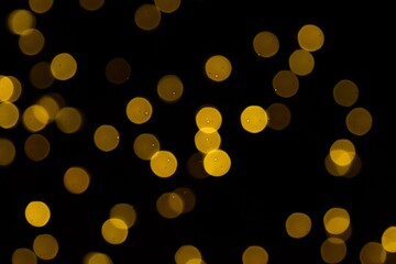 The golden side's or boke on a black background. Merry Christmas and happy New Year. Christmas background.