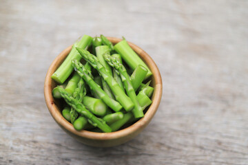 asparagus freesh cutting in wood for being in gredient in cooking 