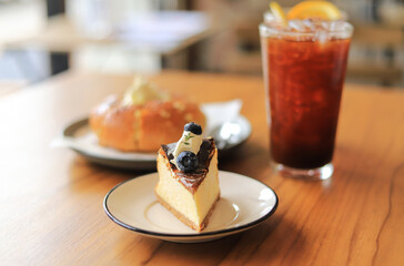 cheese cake with coffee on background for eating 
