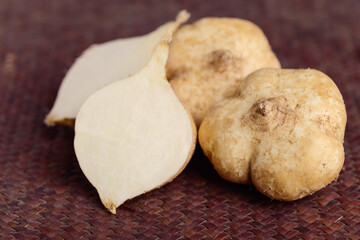 Fresh jicama or yam, Jicama can be eaten raw or cooked, The taste are crisp, juicy, moist, and slightly sweet