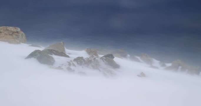 Snow crystals blown in the strong wind and blizzard