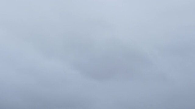 Jumbo Jet Plane coming into land in gray/stormy weather shot in 4k high resolution