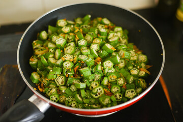 Organic Ladies finger , bhindi masala curry , Okra , vegetables curry leaf from home kitchen garden farm fresh veggie Kerala India. Agriculture harvest .