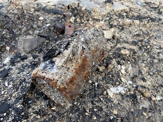 close up ash and can on the ground