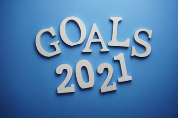 Goals for 2021 alphabet letter on blue background