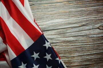 Fototapeta na wymiar Independence Day USA Flag on wooden background