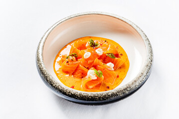 salmon ceviche on the white background.