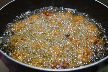 cooking INDIAN CHINESE DRY and crispy MANCHURIAN BALLS frying manchurian balls in oil vessel