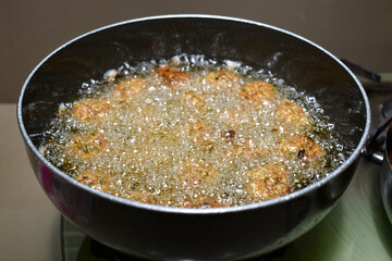 cooking INDIAN CHINESE DRY and crispy GOBI MANCHURIAN BALLS frying manchurian balls in oil vessel