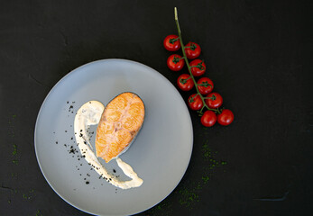 salmon with cherry tomatoes and sauce