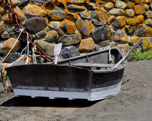 Wooden rowboat tied up on Monhegan Island, ME.