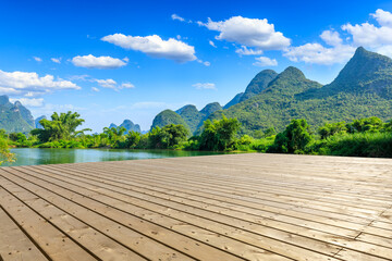 Wooden square floor and green mountain natural scenery in Guilin,China.