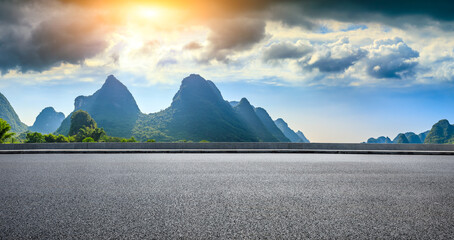 Country asphalt road and green mountain natural scenery in Guilin,China.