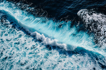 Aerial view to waves in ocean Splashing Waves. Blue clean wavy sea water