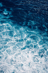 Fototapeta premium Aerial view to waves in ocean Splashing Waves. Blue clean wavy sea water