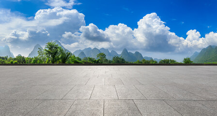 Wide square floor and green mountain natural scenery in Guilin,China.