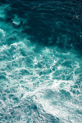 Aerial view to waves in ocean Splashing Waves. Blue clean wavy sea water