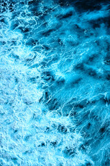 Aerial view to waves in ocean Splashing Waves. Blue clean wavy sea water