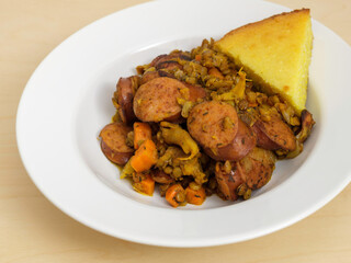 Cassoulet made with kielbasa and lentils with a side of cornbread 
