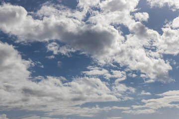 beautiful fluffy clouds and sky background