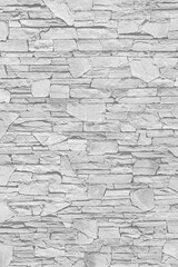 Gray stone wall as a background or texture.