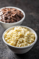 Grated white chocolate. Chocolate flakes.