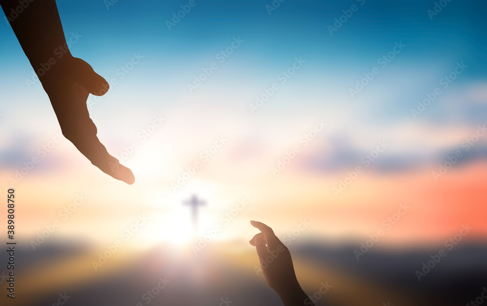 Wall mural help hand of god reaching over blurred cross on sunrise background - Wall murals