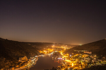 Crimea, Balaclava at night top view. Night bay.