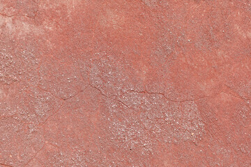 Texture detail of squiggle lines and cracks on yellow concrete, background