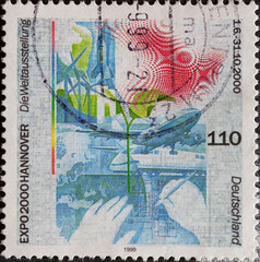 GERMANY - CIRCA 1999 : a postage stamp from Germany, showing some technological products for the world exhibition EXPO 2000, Hanover