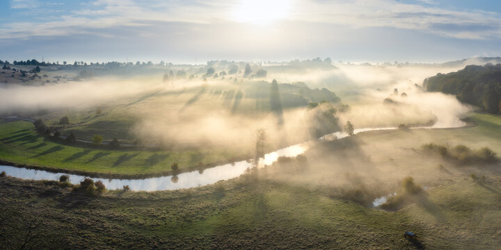 Panorama of Eselsburger Tal, valley in the morning with mist, fog. Near Heidenheim. Nature reservoir