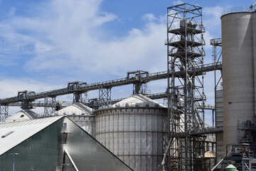 Closeup shot of a big industrial factory under a blue sky