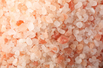 Pink himalayan salt on whole background, close up
