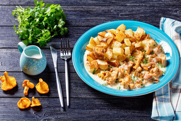 fried potato with chanterelle sauce on a plate