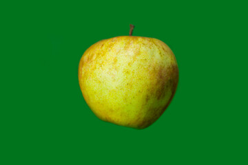 Apple on a green background