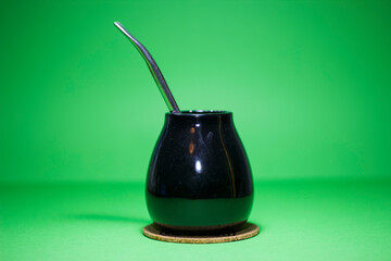 Calabasas, bombilla for Yerba mate on a green background