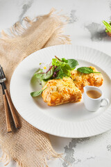 Pie with liver and cream sauce