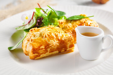 Pie with liver and cream sauce