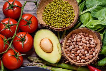 various vegetables background. mash, beans, avocado, tomatoes. Health vegan and vegetarian food concept. Foods high in antioxidants, fiber, smart carbohydrates and vitamins. Top view