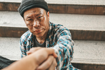 Asia Senior homeless man on walkway street in the city.	
