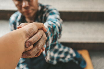 Asia Senior homeless man on walkway street in the city.	
