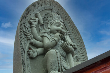 statue on the stairs in Chinese temple. Selective focus
