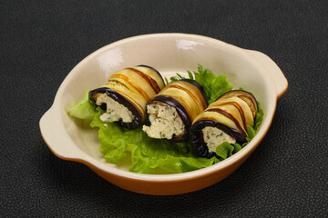 Stuffed eggplant roll with cheese and herbs