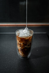 iced coffee put on black background